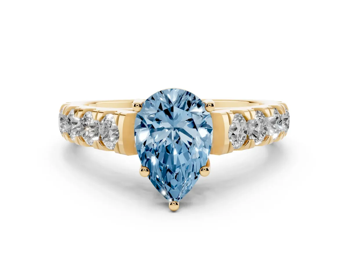 Fancy Blue Pear Cut Diamond Solitaire Ring Set in Yellow gold with Cut-Down Micro Pavé Band and Prong Setting