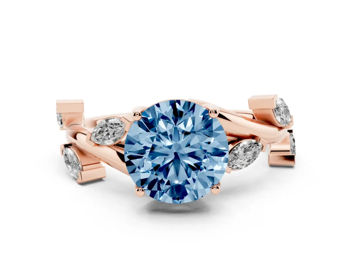 Fancy Blue Round Cut Diamond Solitaire Ring Set in Rose gold with Twisted Marquise Accent Band