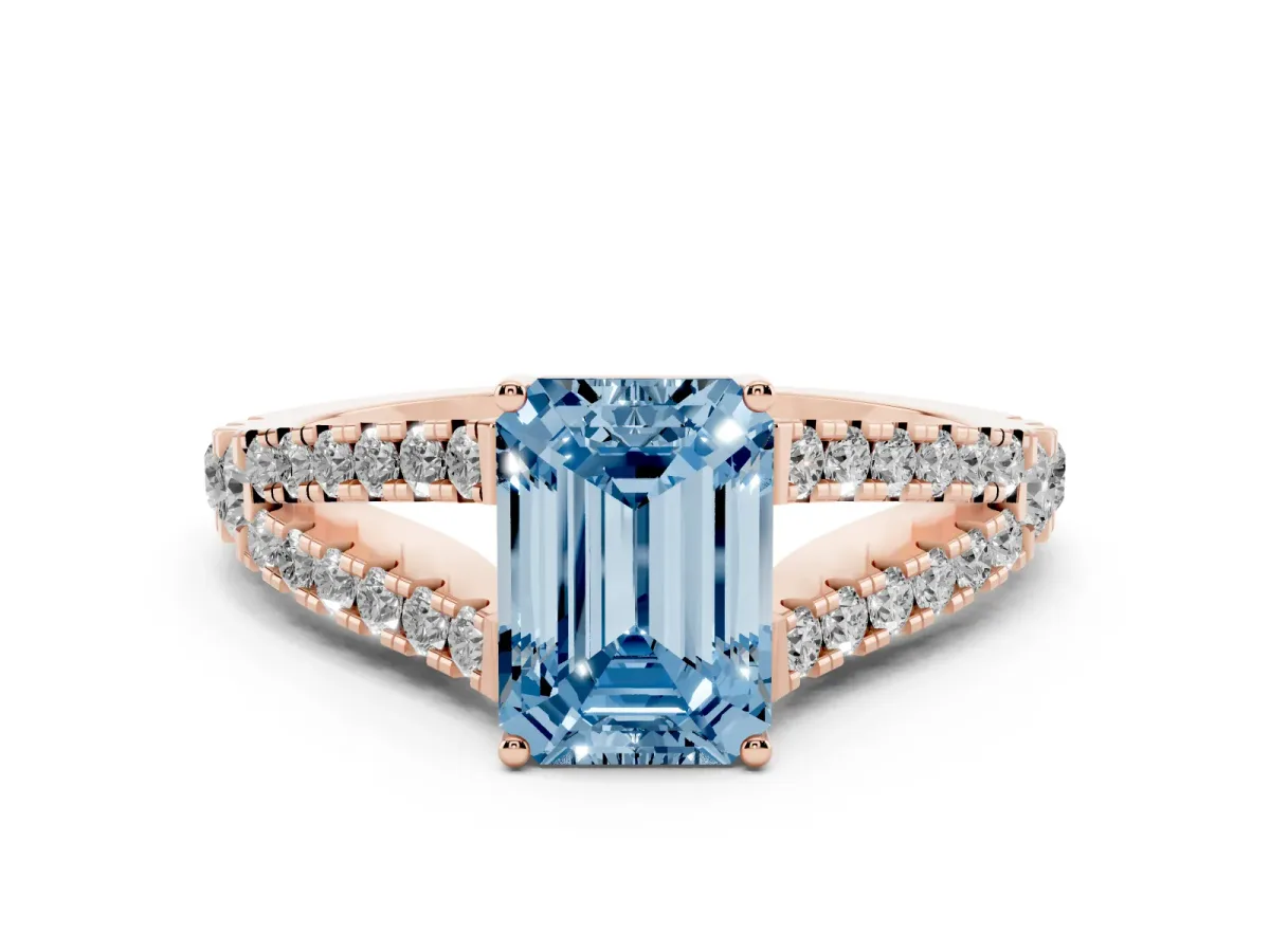 Fancy Blue Emerald Cut Diamond Split Shank Pavé Engagement Ring Set in Rose gold with Prong-Held Center Stone
