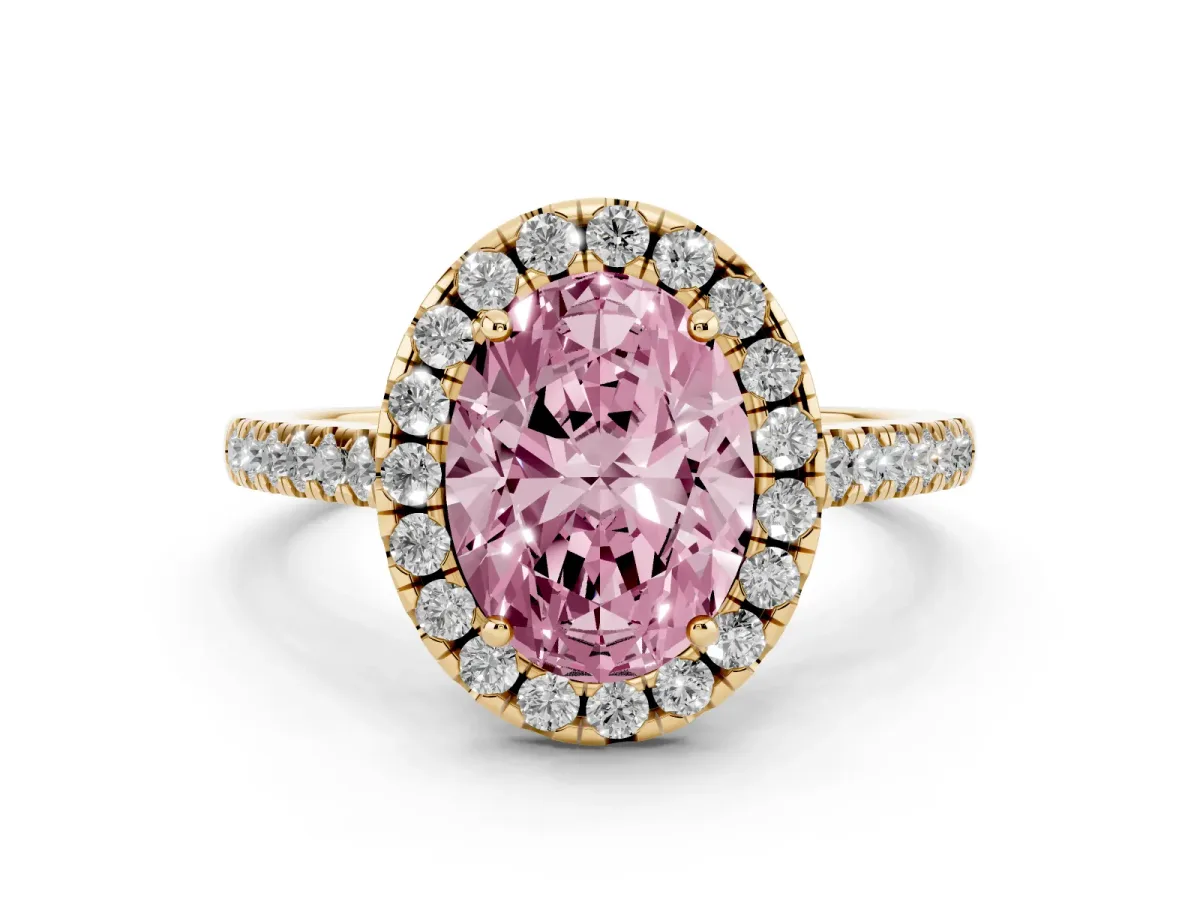Fancy Pink Oval Cut Diamond Pavé Halo Engagement Ring Set in Yellow gold with Pavé Band and Prong Setting