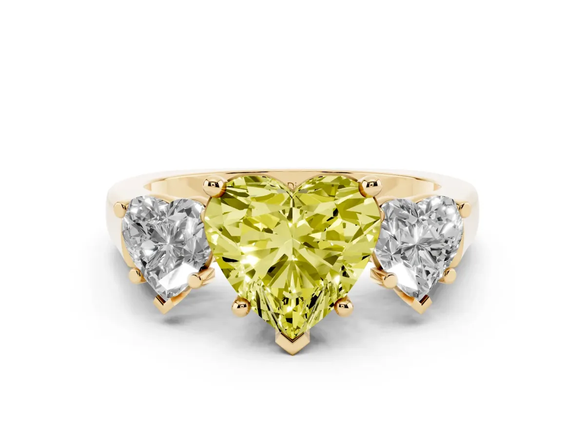 Fancy Yellow Heart Cut Diamond Three-Stone Trellis Ring Set in Yellow gold with Comfort Fit Band