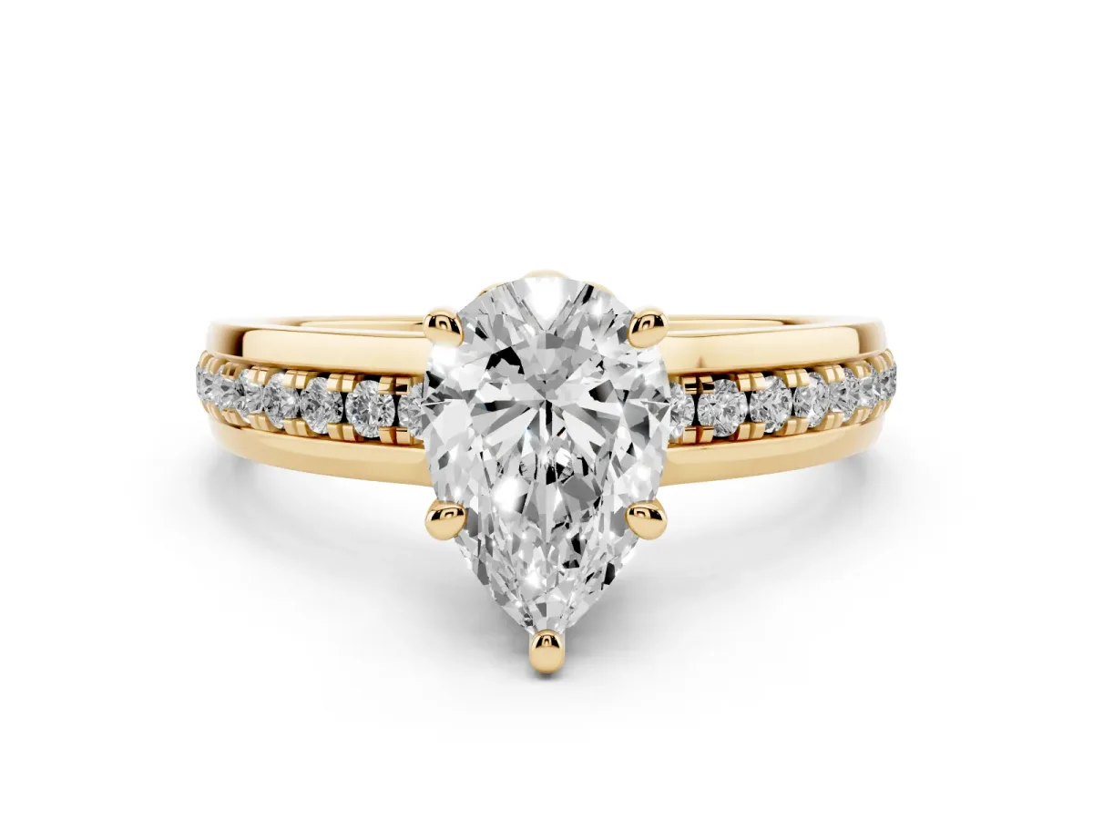 Pear Cut Diamond Solitaire Ring Set in Yellow gold with Channel Set Band and Prong Setting