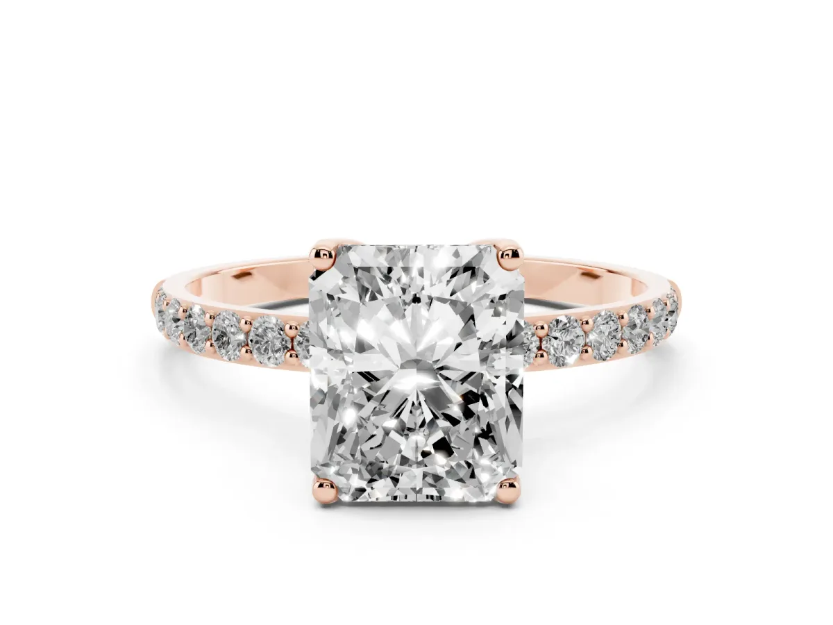 Radiant Cut Diamond Solitaire Engagement Ring Set in Rose gold with Round Pavé Band and Prong Setting