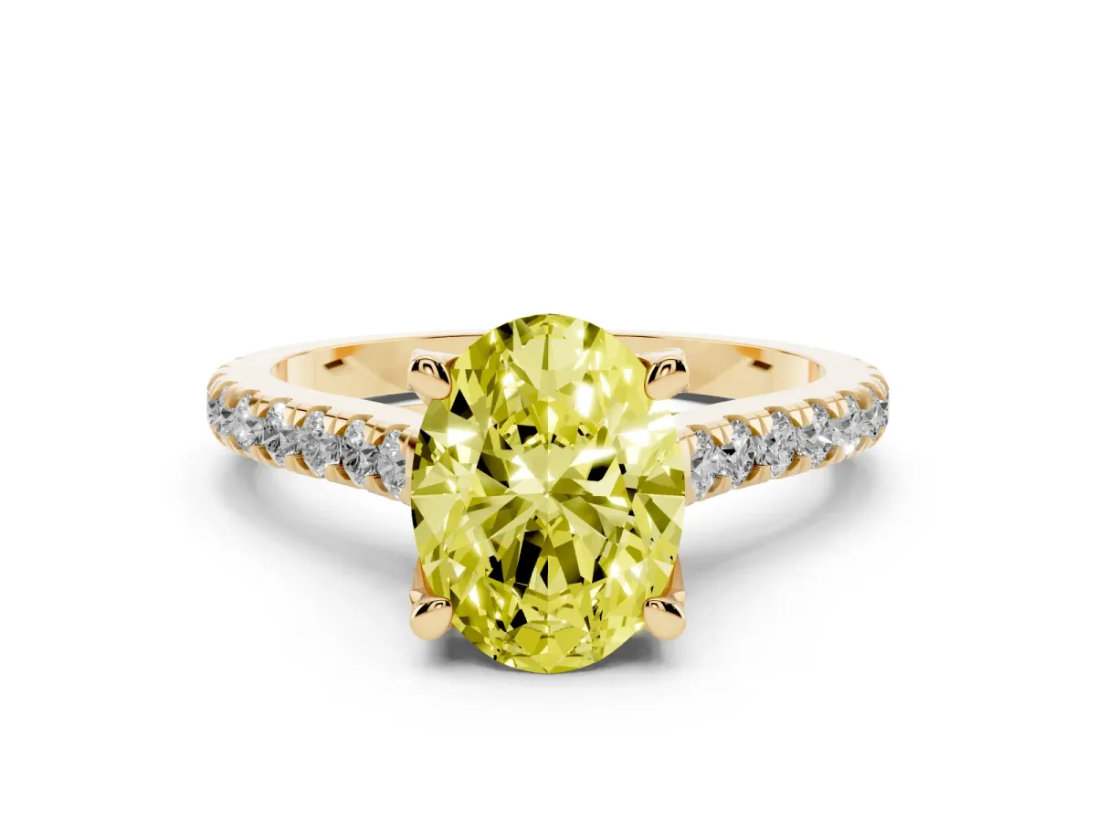 Fancy Yellow Oval Cut Diamond Solitaire Ring Set in Yellow gold with Brilliant Pavé Band and Prong Setting