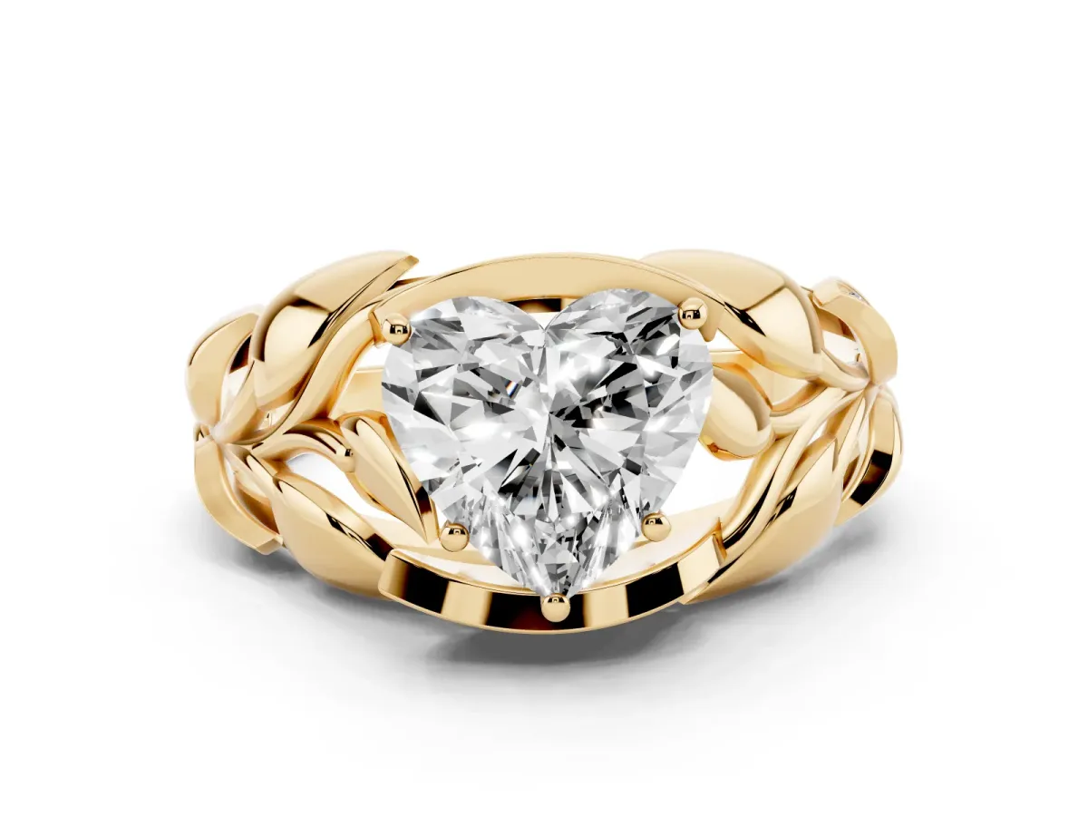 Heart Cut Diamond Leaf-Inspired Engagement Ring Set in Yellow gold with Round Accents