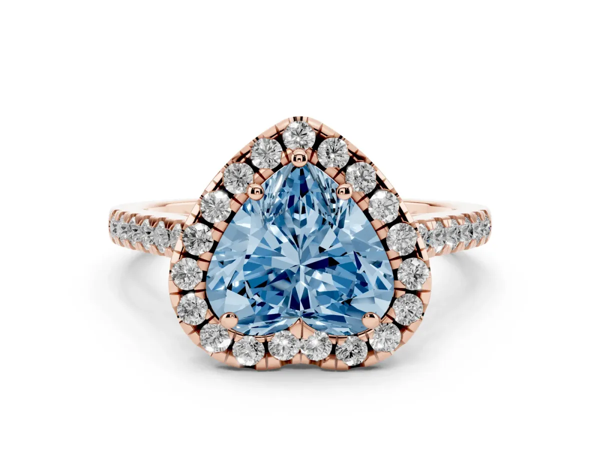 Fancy Blue Heart Cut Diamond Pavé Halo Engagement Ring Set in Rose gold with Pavé Band and Prong Setting