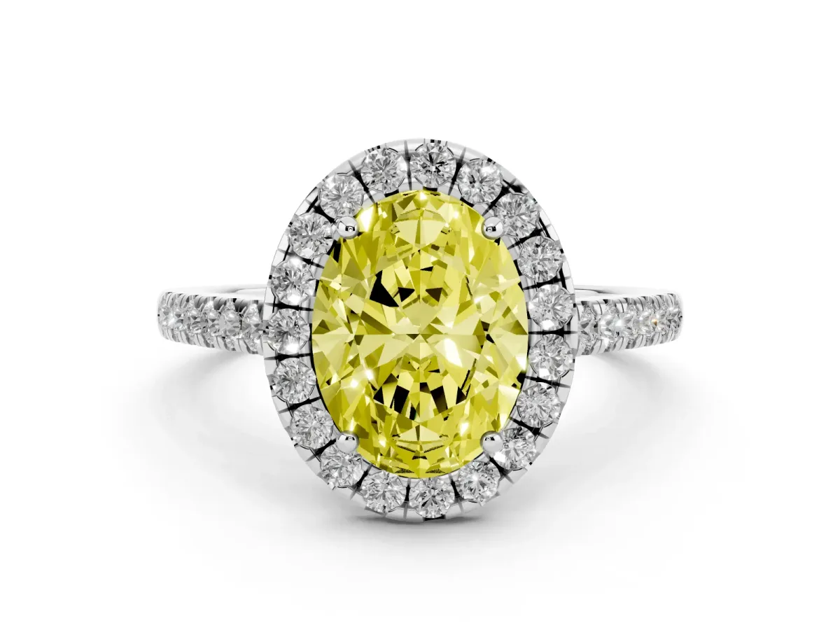 Fancy Yellow Oval Cut Diamond Halo Pavé Engagement Ring Set in Silver with Prong Setting