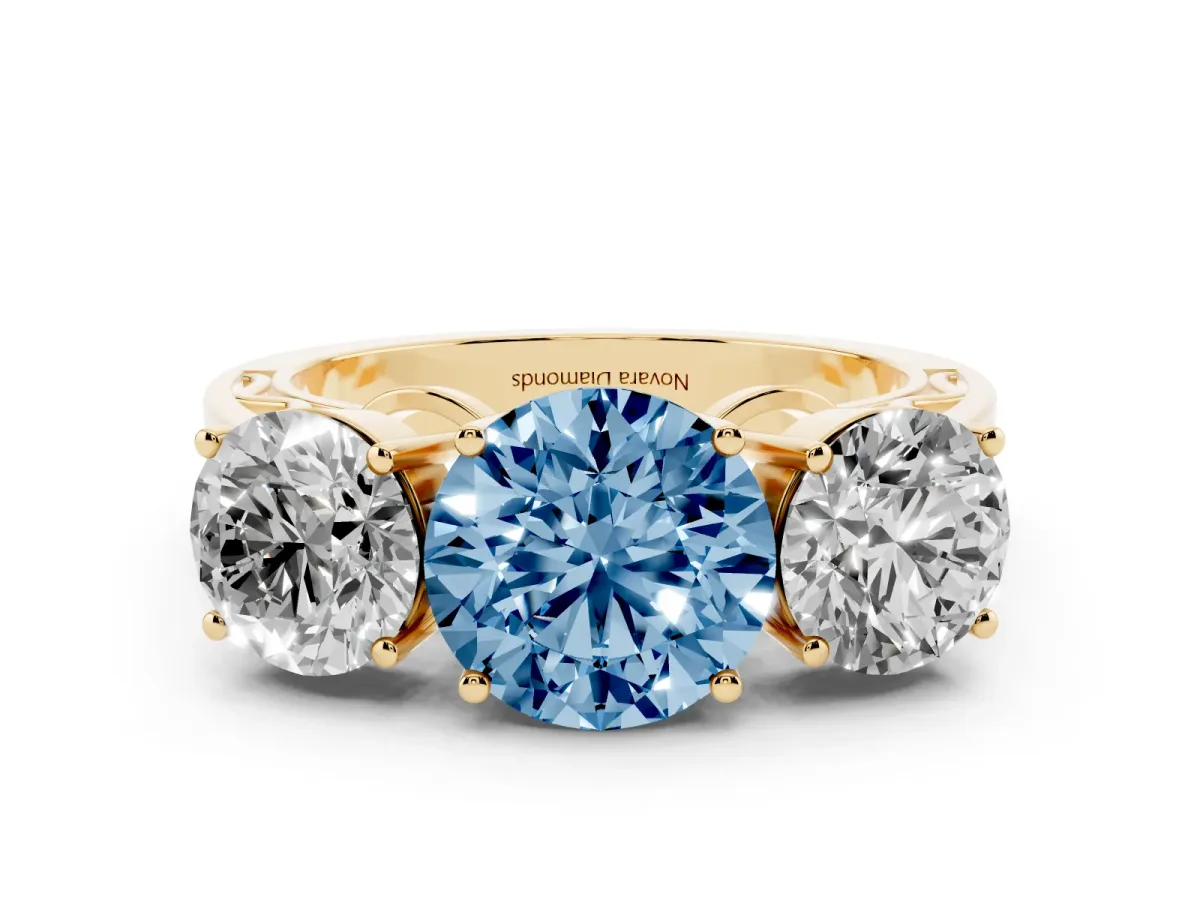Fancy Blue Round Cut Diamond Three-Stone Ring Set in Yellow gold with Textured Band