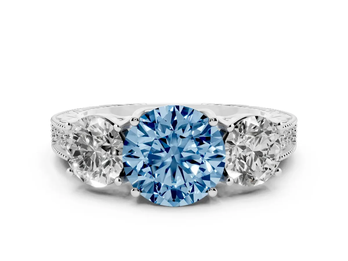 Fancy Blue Round Cut Diamond Three-Stone Engagement Ring Set in White gold with Milgrain Pavé Band