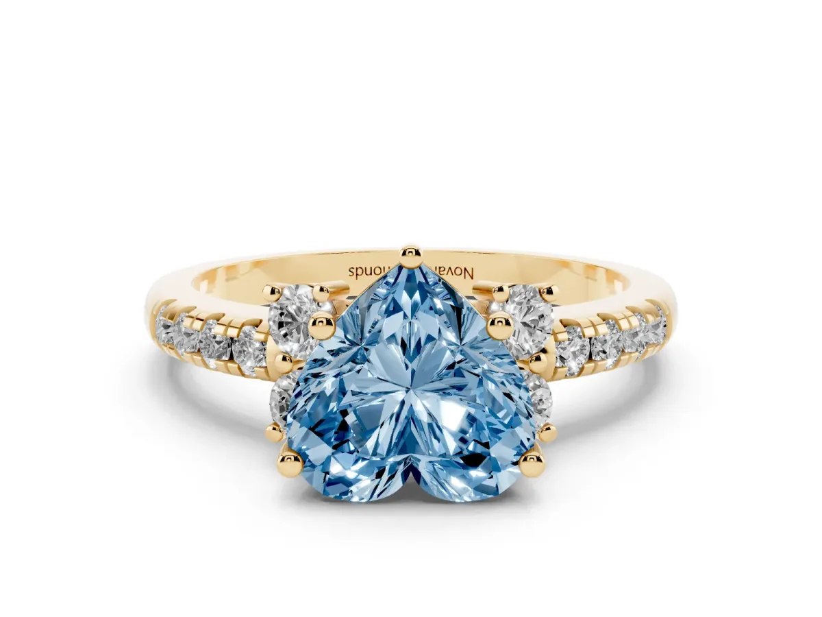 Fancy Blue Heart Cut Diamond Three-Stone Pavé Ring Set in Yellow gold with Prong Setting