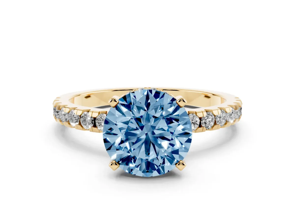 Fancy Blue Round Cut Diamond Pavé Solitaire Ring Set in Yellow gold with Round Band Accents and Prong Setting