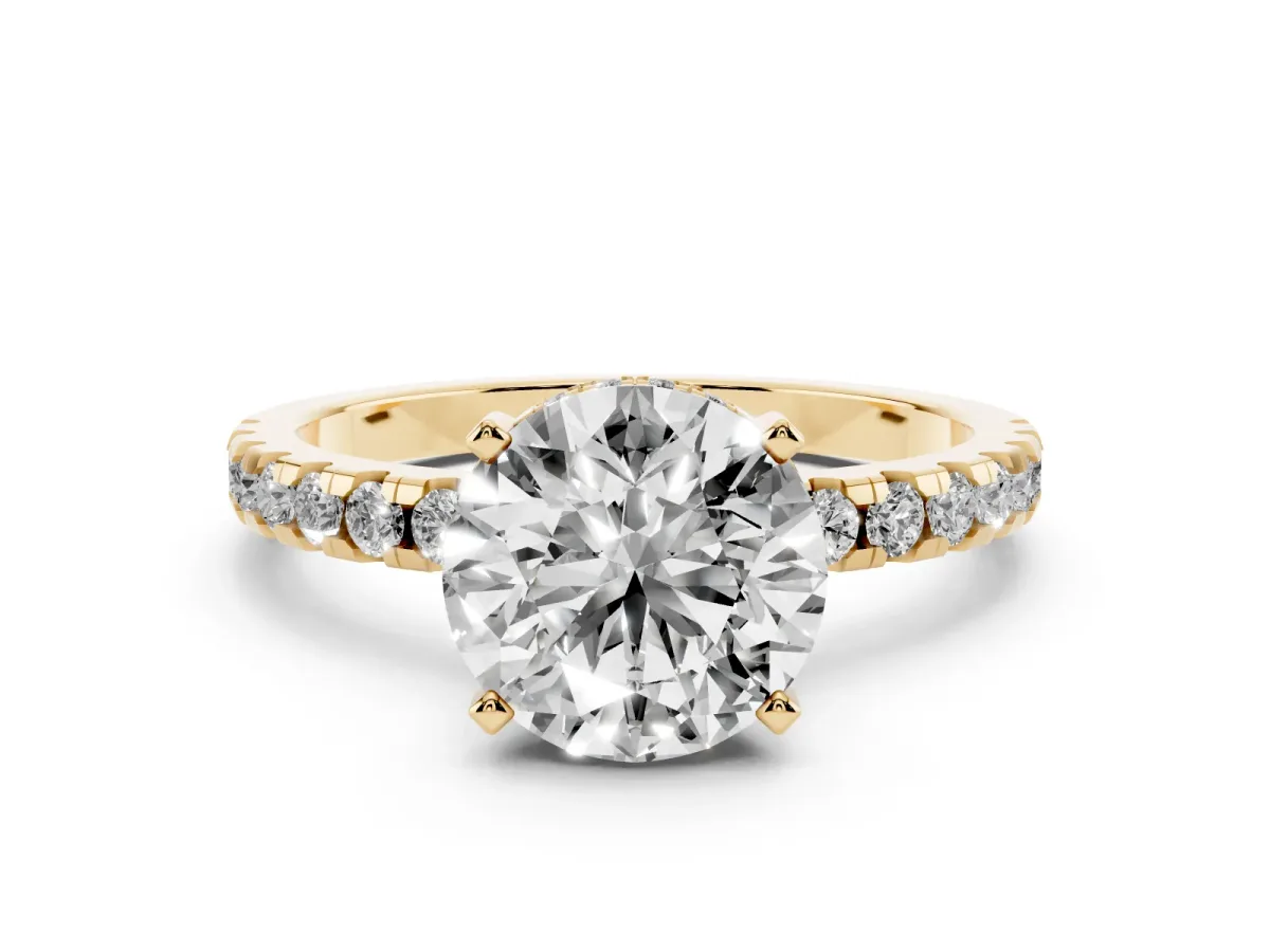 Round Cut Diamond Pavé Solitaire Ring Set in Yellow gold with Round Band Accents and Prong Setting