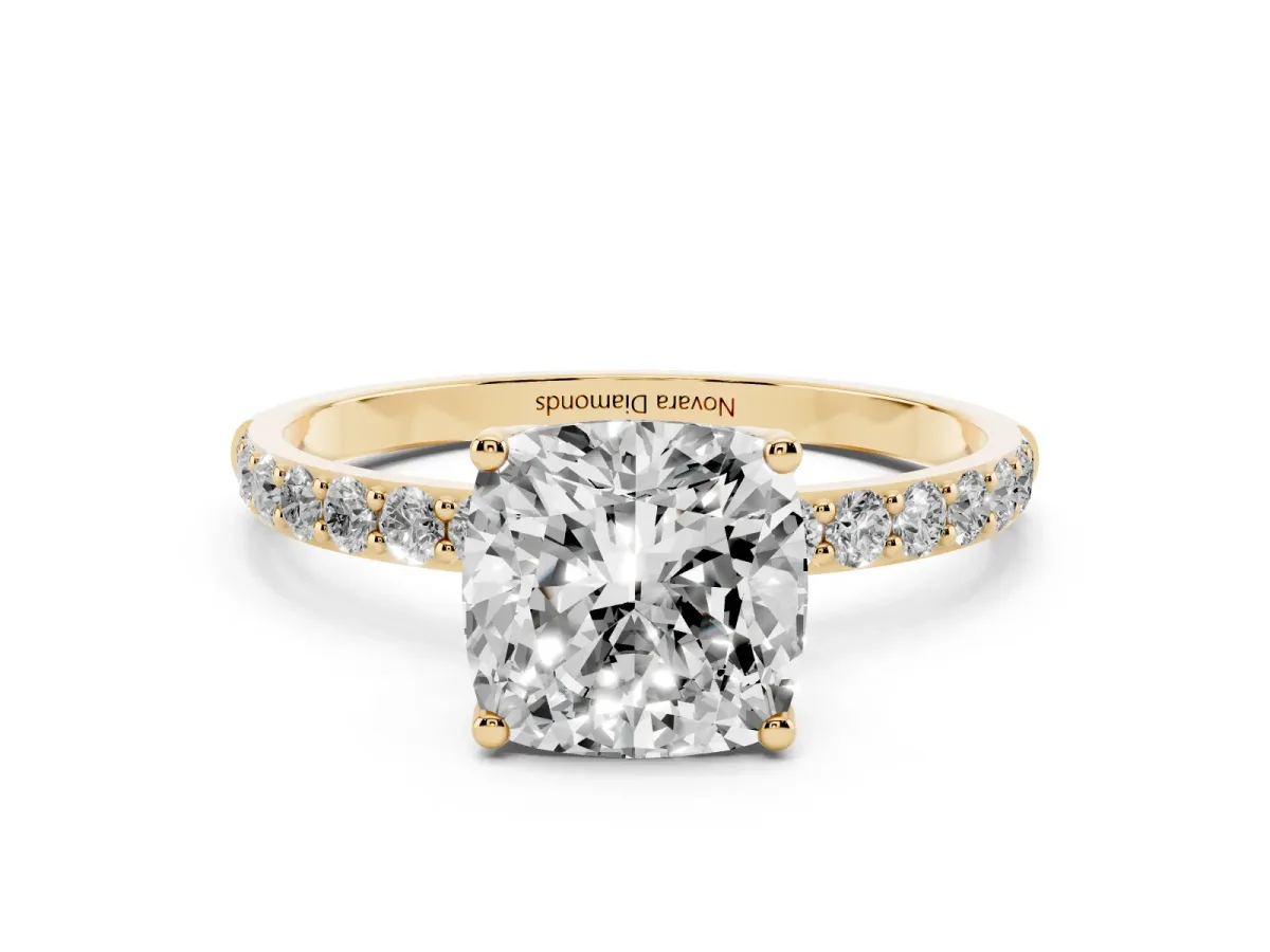 Cushion Cut Diamond Solitaire Engagement Ring Set in Yellow gold with Round Pavé Band and Prong Setting