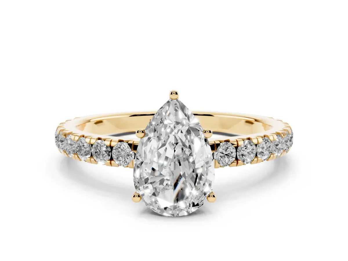 Pear Cut Diamond Pavé Solitaire Engagement Ring Set in Yellow gold with Prong Setting