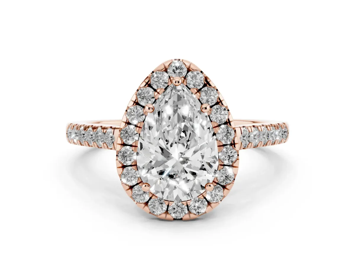 Pear Cut Diamond Halo Pavé Engagement Ring Set in Rose gold with Prong Setting