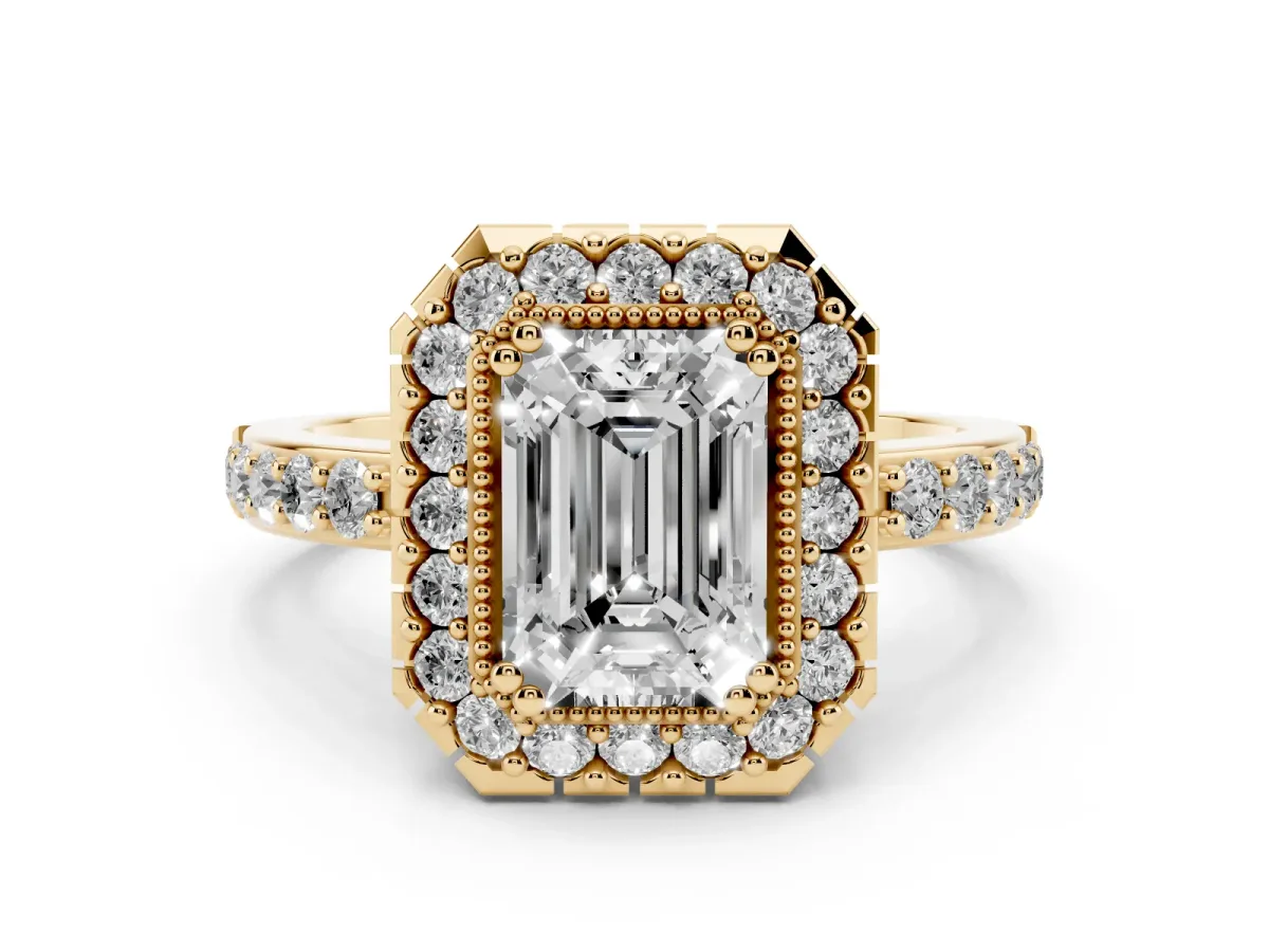 Emerald Cut Diamond Halo Ring Set in Yellow gold with Pavé Shank and Prong Setting