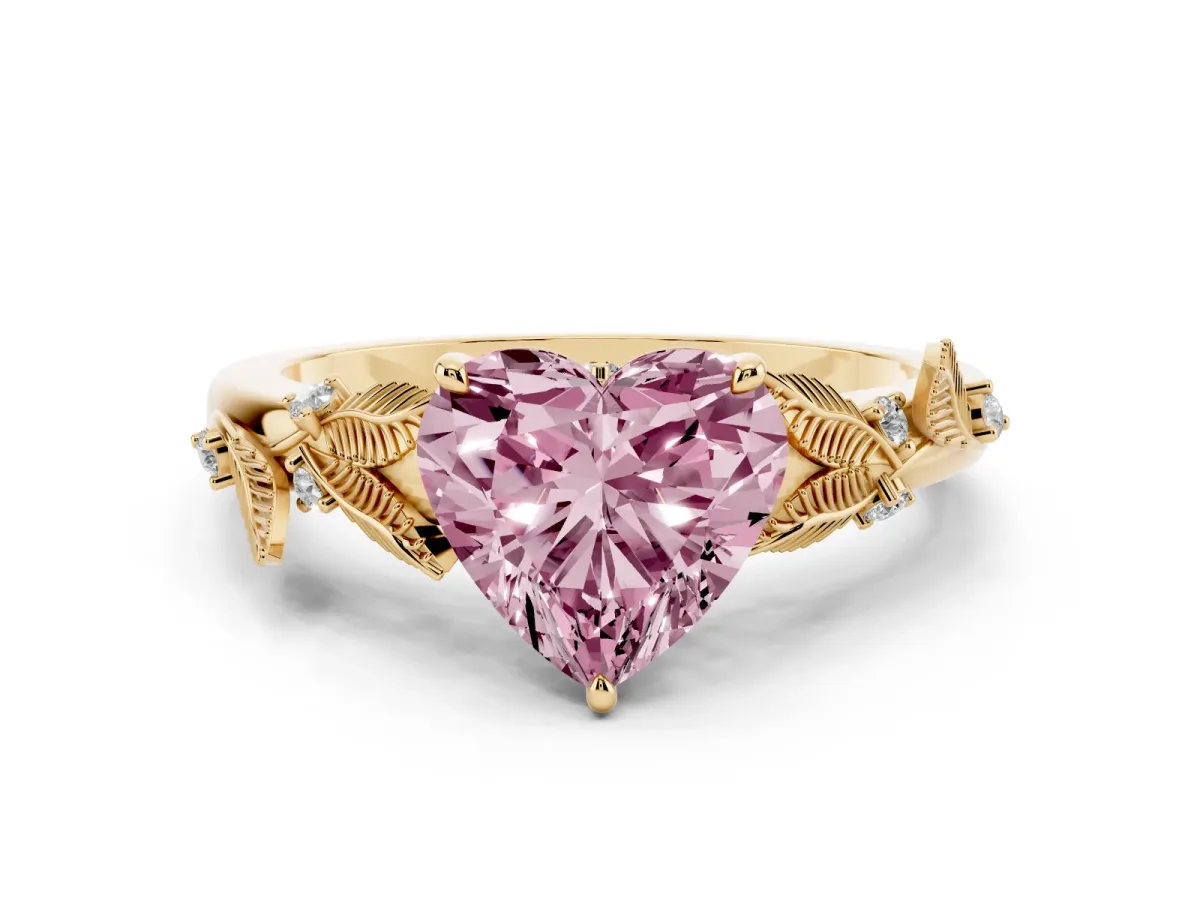 Fancy Pink Heart Cut Diamond Solitaire Ring Set in Yellow gold with Leaf Motif Band