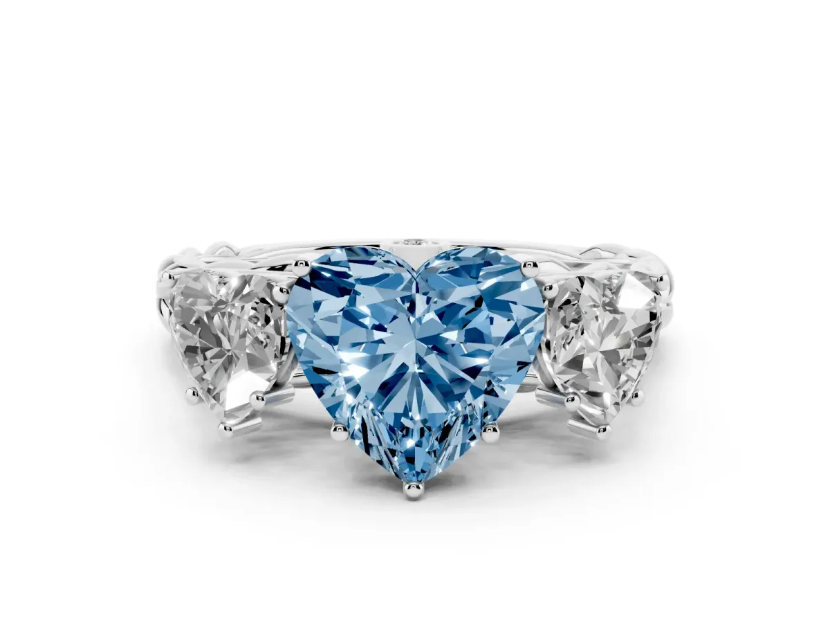 Fancy Blue Heart Cut Diamond Three-Stone Ring Set in Platinum with Braided Band