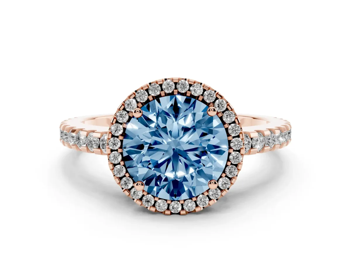 Fancy Blue Round Cut Diamond Halo Ring Set in Rose gold with Pavé Shoulders and Halo-Framed Center