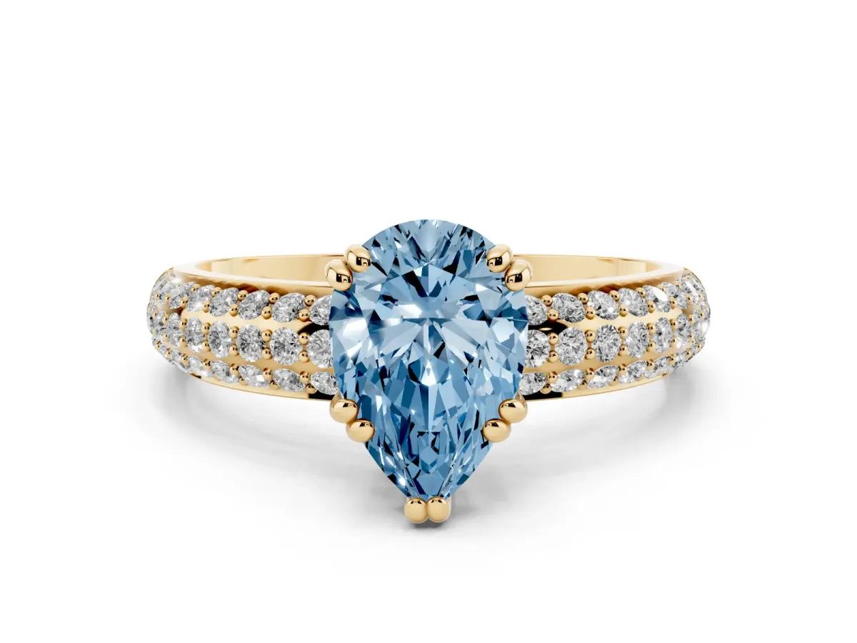 Fancy Blue Pear Cut Diamond Solitaire Ring Set in Yellow gold with Multi-Row Round Pavé Band and Prong Setting