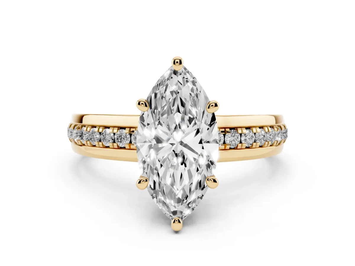Marquise Cut Diamond Solitaire Ring Set in Yellow gold with Channel Set Band and Prong Setting