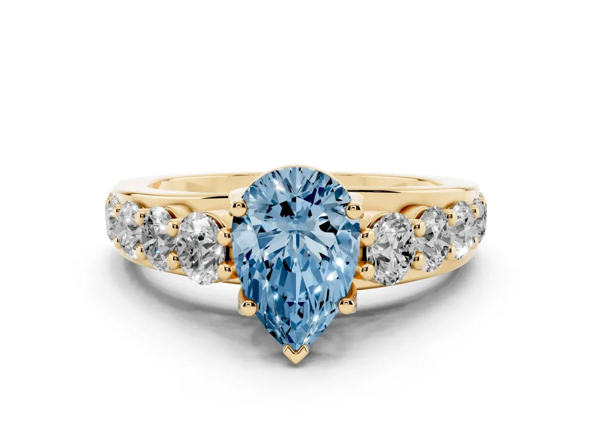 Fancy Blue Pear Cut Diamond Pavé Engagement Ring Set in Yellow gold with Prong Setting