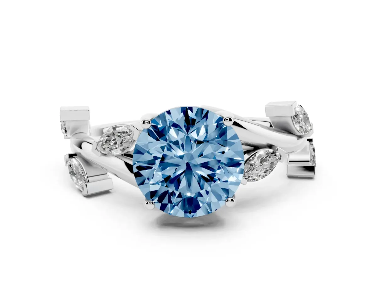 Fancy Blue Round Cut Diamond Solitaire Ring Set in White gold with Twisted Marquise Accent Band