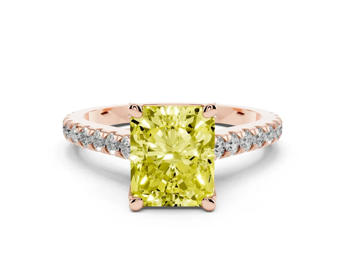 Fancy Yellow Radiant Cut Diamond Solitaire Ring Set in Rose gold with Brilliant Pavé Band and Prong Setting
