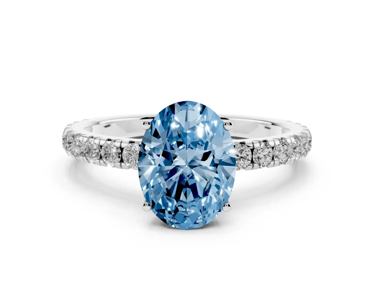 Fancy Blue Oval Cut Diamond Pavé Solitaire Engagement Ring Set in Silver with Prong Setting
