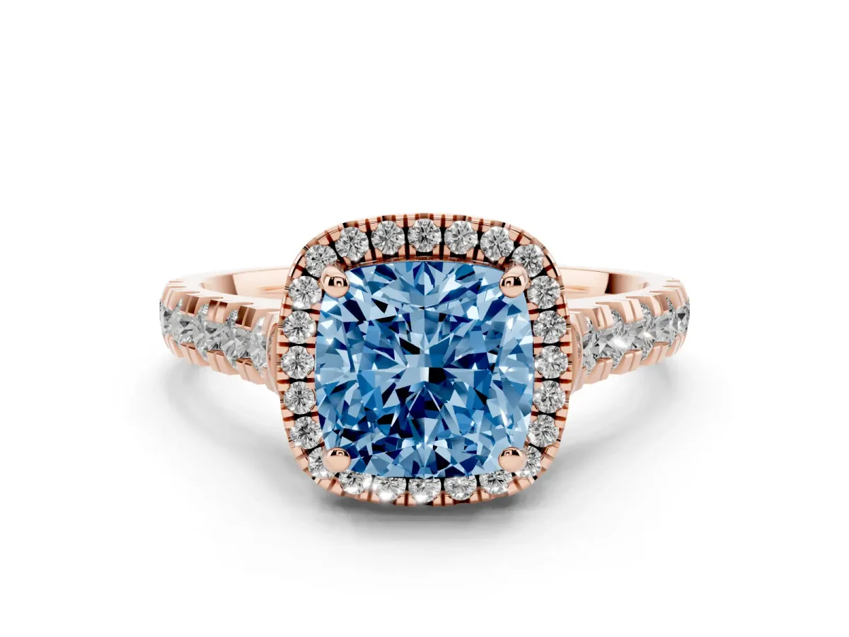 Fancy Blue Cushion Cut Diamond Halo Engagement Ring Set in Rose gold with Pavé Band and Prong-Set Center