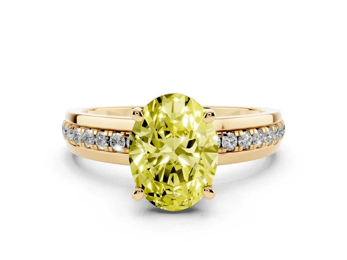 Fancy Yellow Oval Cut Diamond Solitaire Ring Set in Yellow gold with Channel Set Band and Prong Setting