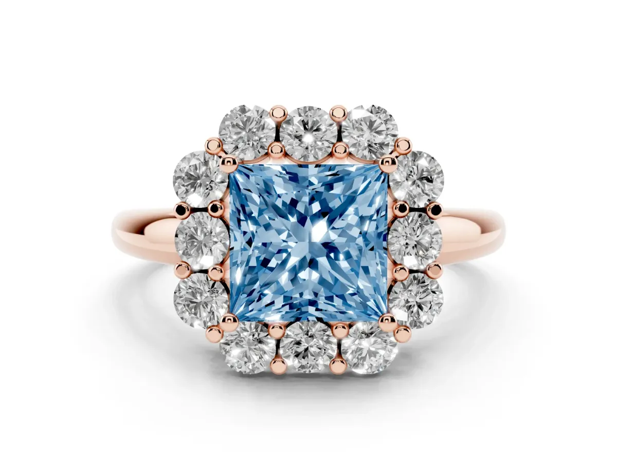 Fancy Blue Princess Cut Diamond Milgrain Halo Solitaire Ring Set in Rose gold with Bezel Set Side Stones and Pavé Band