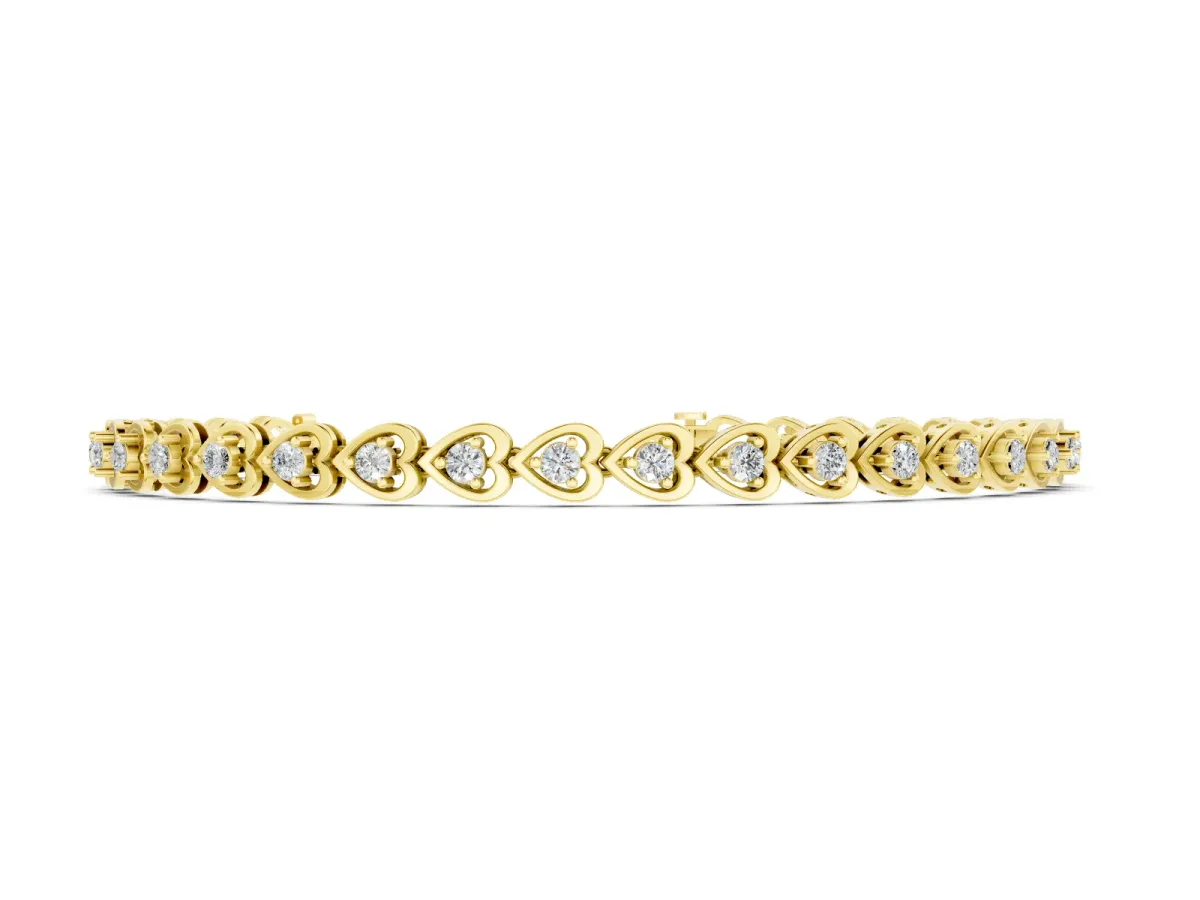 Heart Shape Diamond Tennis Bracelet Set in Yellow gold with Channel and Four-Prong Setting