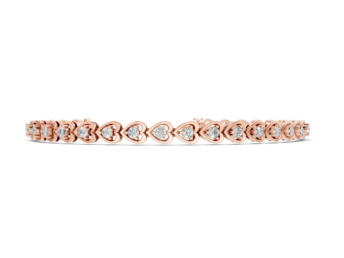 Heart Shape Diamond Tennis Bracelet Set in Rose gold with Channel and Four-Prong Setting