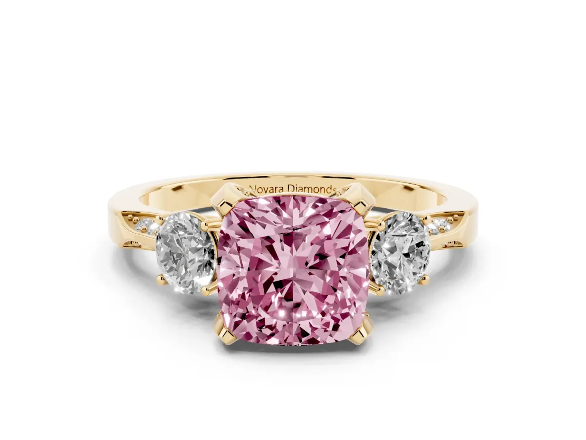 Fancy Pink Cushion Cut Diamond Three-Stone Ring Set in Yellow gold with Pavé Band and Smaller Side Stones