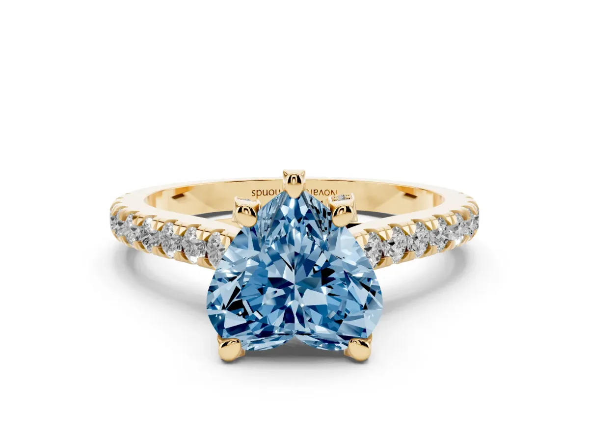 Fancy Blue Heart Cut Diamond Solitaire Ring Set in Yellow gold with Brilliant Pavé Band and Prong Setting