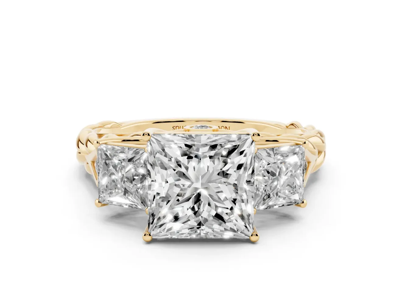 Princess Cut Diamond Three-Stone Ring Set in Yellow gold with Braided Band