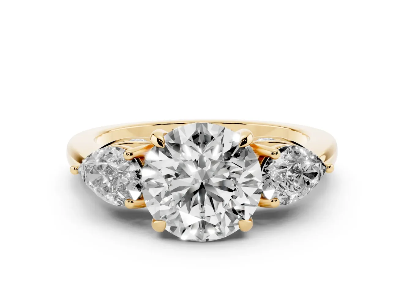 Round Cut Diamond Three-Stone Ring Set in Yellow gold with Pear Side Stones