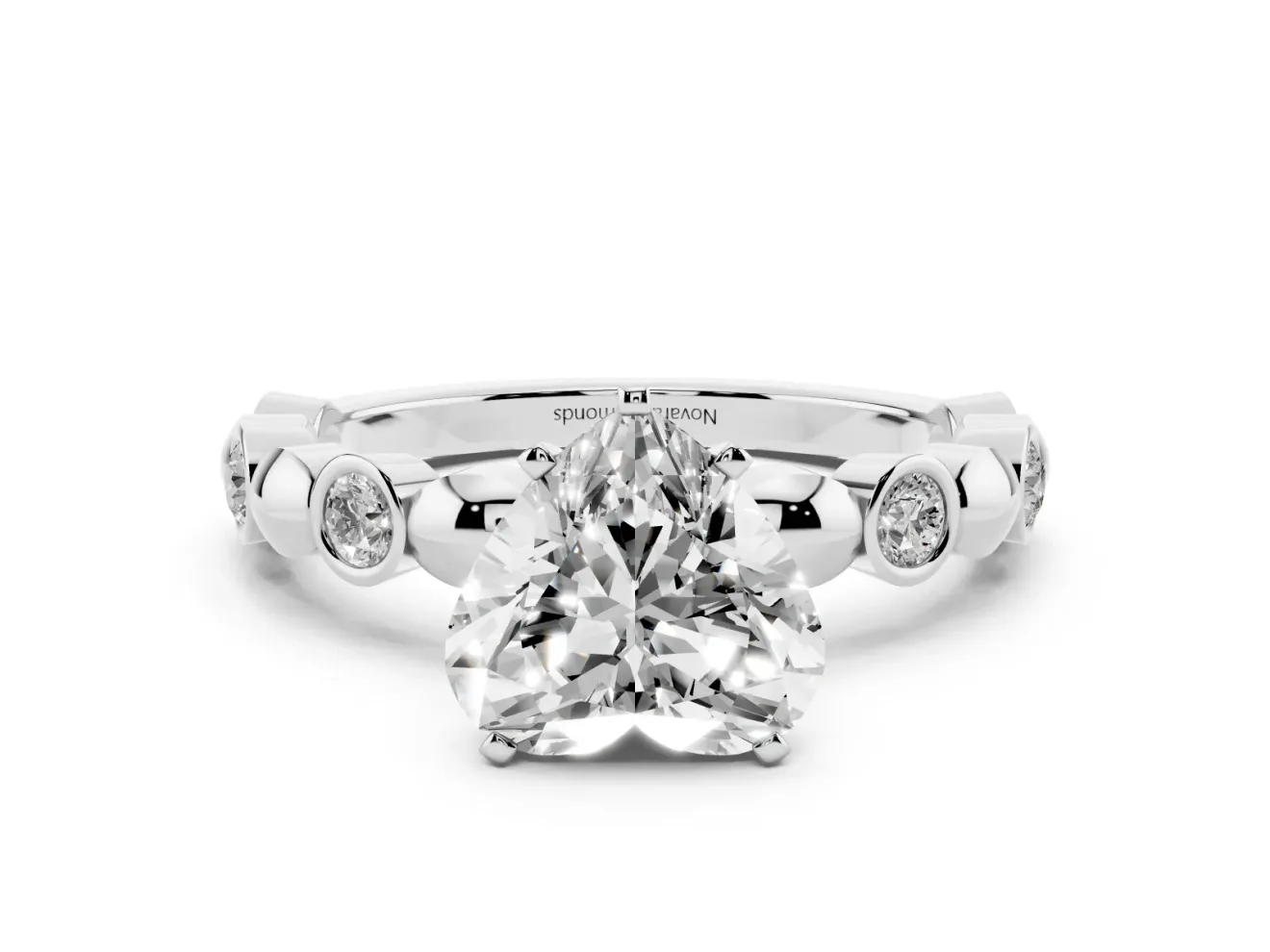 Heart Cut Diamond Solitaire Ring Set in Platinum with Bezel-Set Accents on Beaded Band and Prong Setting