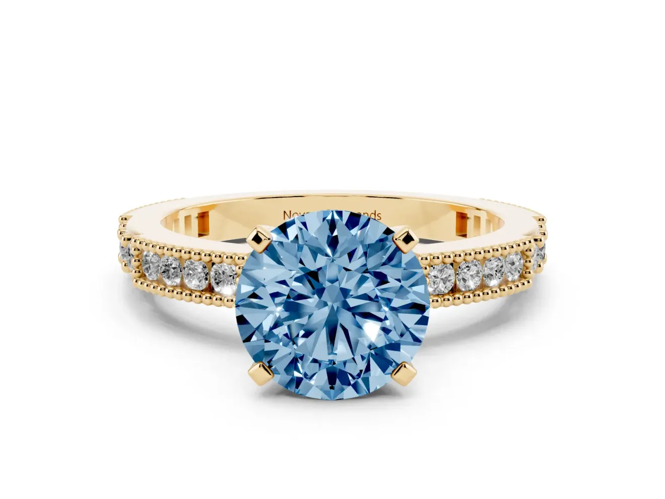 Fancy Blue Round Cut Diamond Solitaire Ring Set in Yellow gold with Slim Pavé Band and Prong Setting