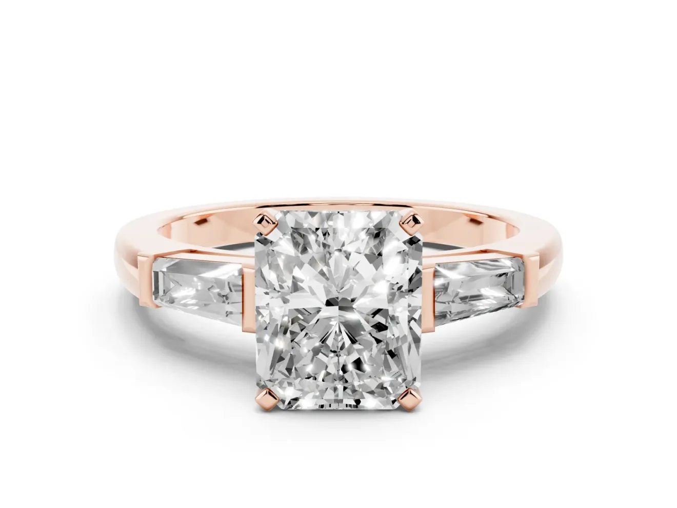 Radiant Cut Diamond Solitaire Ring Set in Rose gold with Tapered Baguette Side Stones and Prong Setting