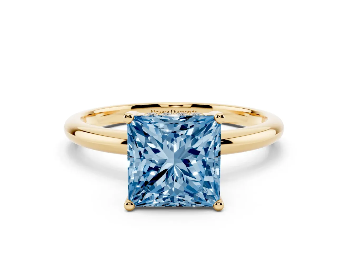 Fancy Blue Princess Cut Diamond Solitaire Engagement Ring Set in Yellow gold with Prong Setting and Polished Band