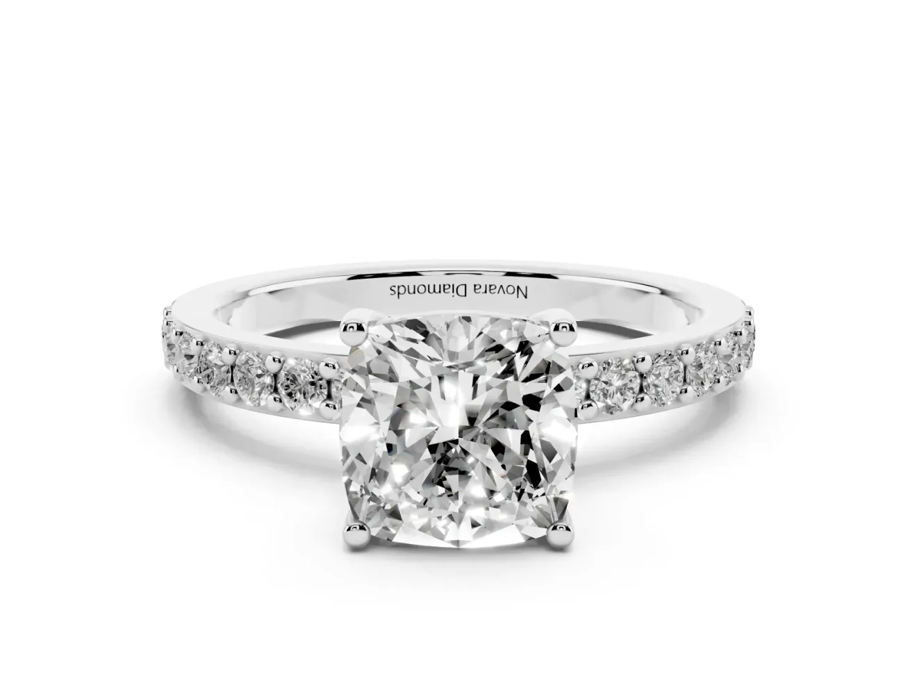 Cushion Cut Diamond Solitaire Set in Platinum with Round Pavé Band and Prong Setting