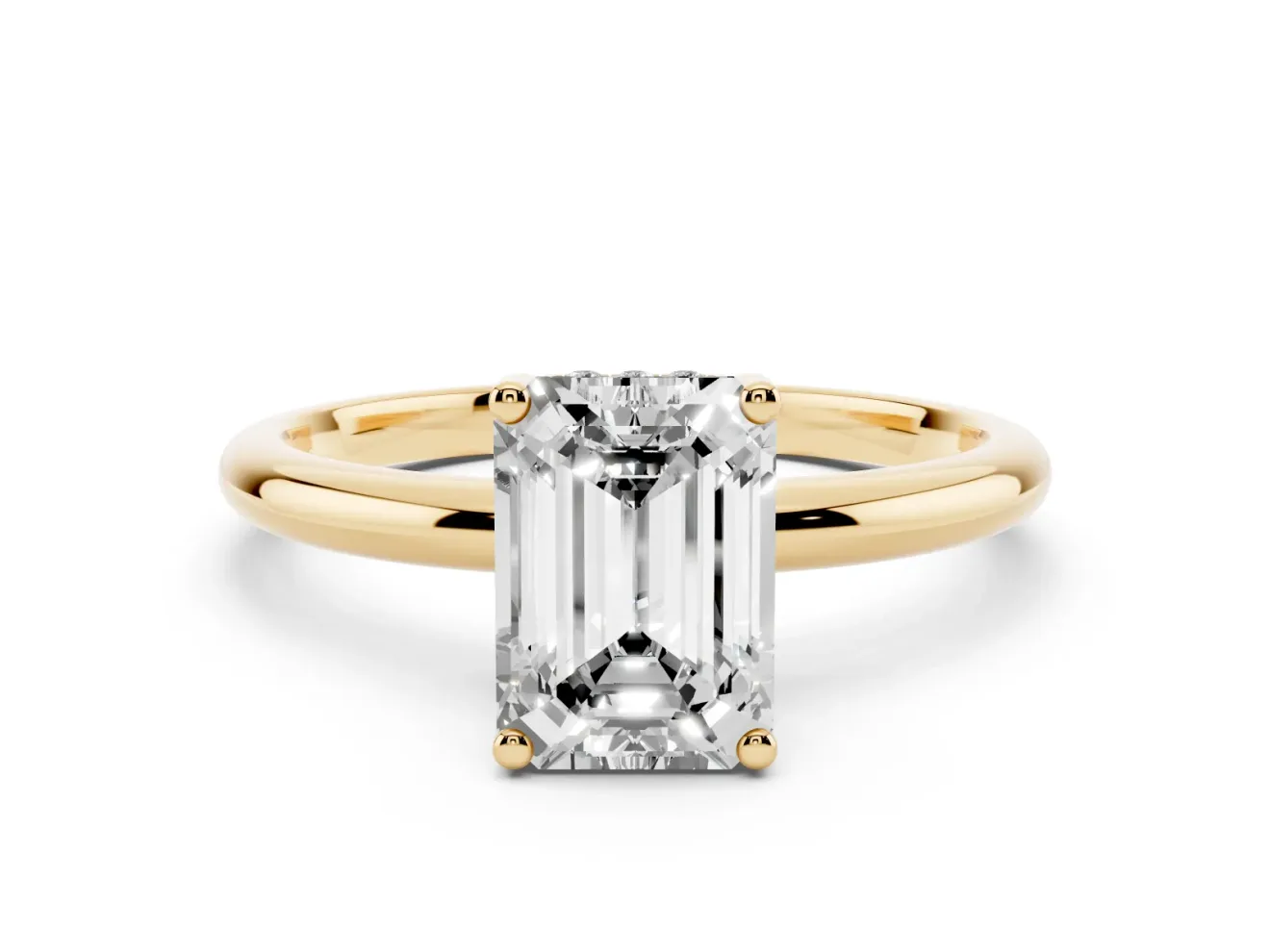Emerald Cut Diamond Solitaire Engagement Ring Set in Yellow gold with Prong Setting and Polished Band