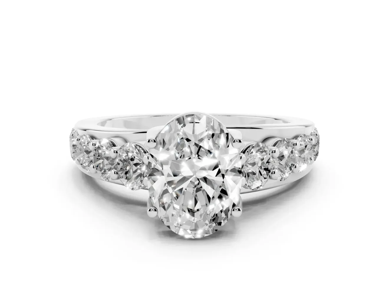 Oval Graduated Side Stone Engagement Ring Setting | Shared Prong Rails | White Gold
