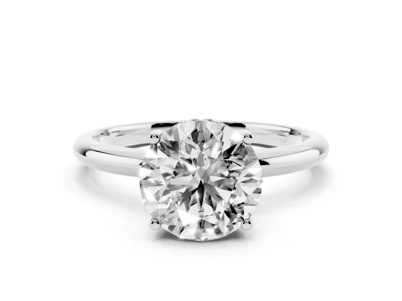 Round Cut Diamond Solitaire Engagement Ring Set in White gold with Prong Setting and Polished Band