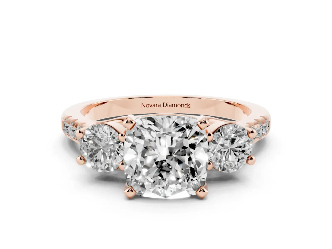 Three-Stone Cushion Cut Diamond Pavé Band Ring Set in Rose gold with Prong-Set Trio