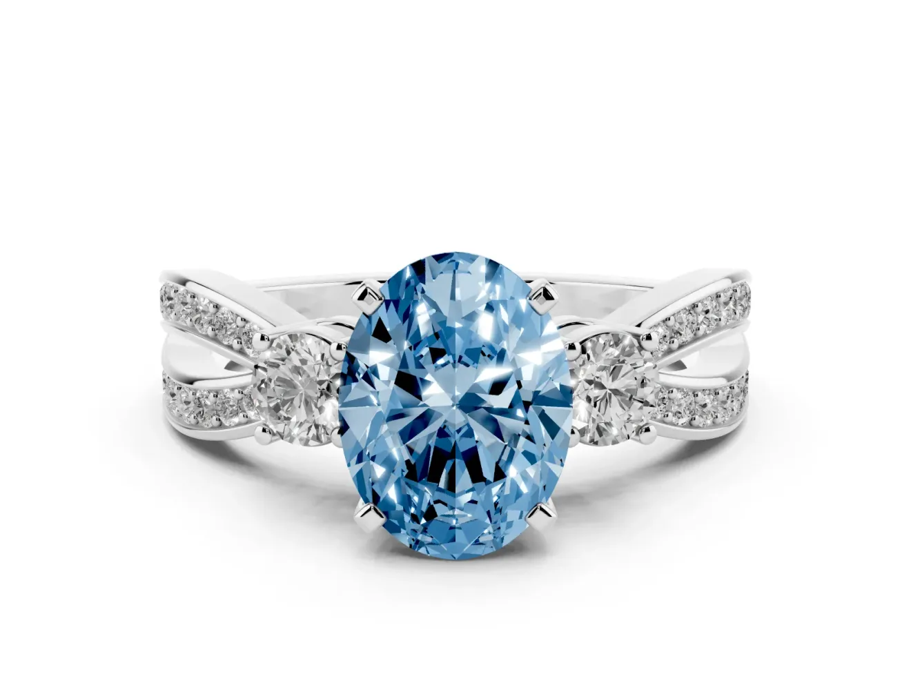 Fancy Blue Three-Stone Oval Cut Diamond Twist Band Ring Set in White gold with Pavé Accents and Prong Setting