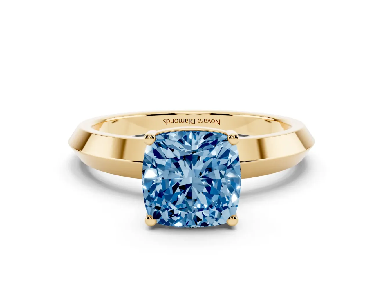Fancy Blue Cushion Cut Diamond Solitaire Engagement Ring Set in Yellow gold with Flat Band and Prong Setting