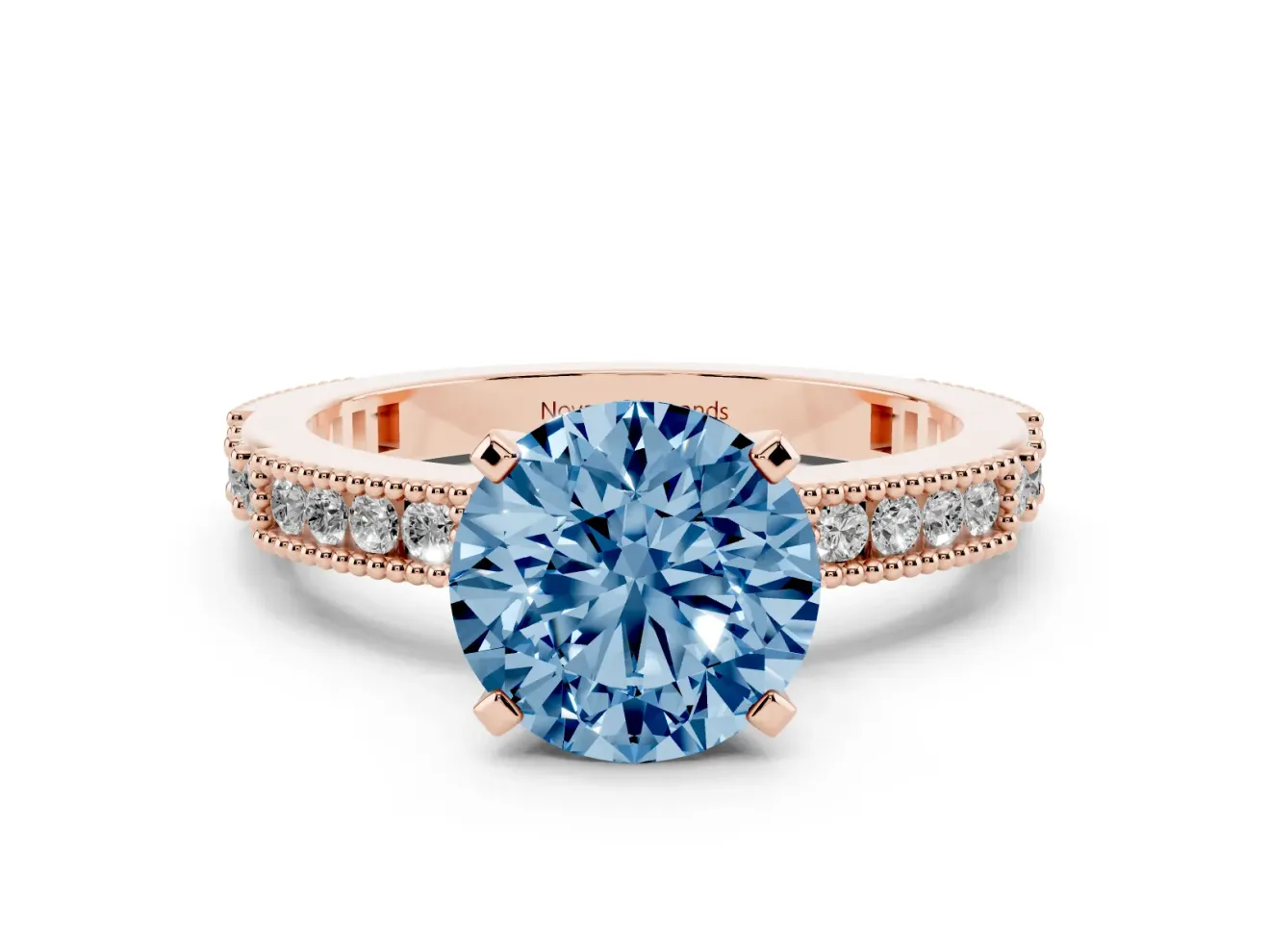 Fancy Blue Round Cut Diamond Solitaire Ring Set in Rose gold with Slim Pavé Band and Prong Setting